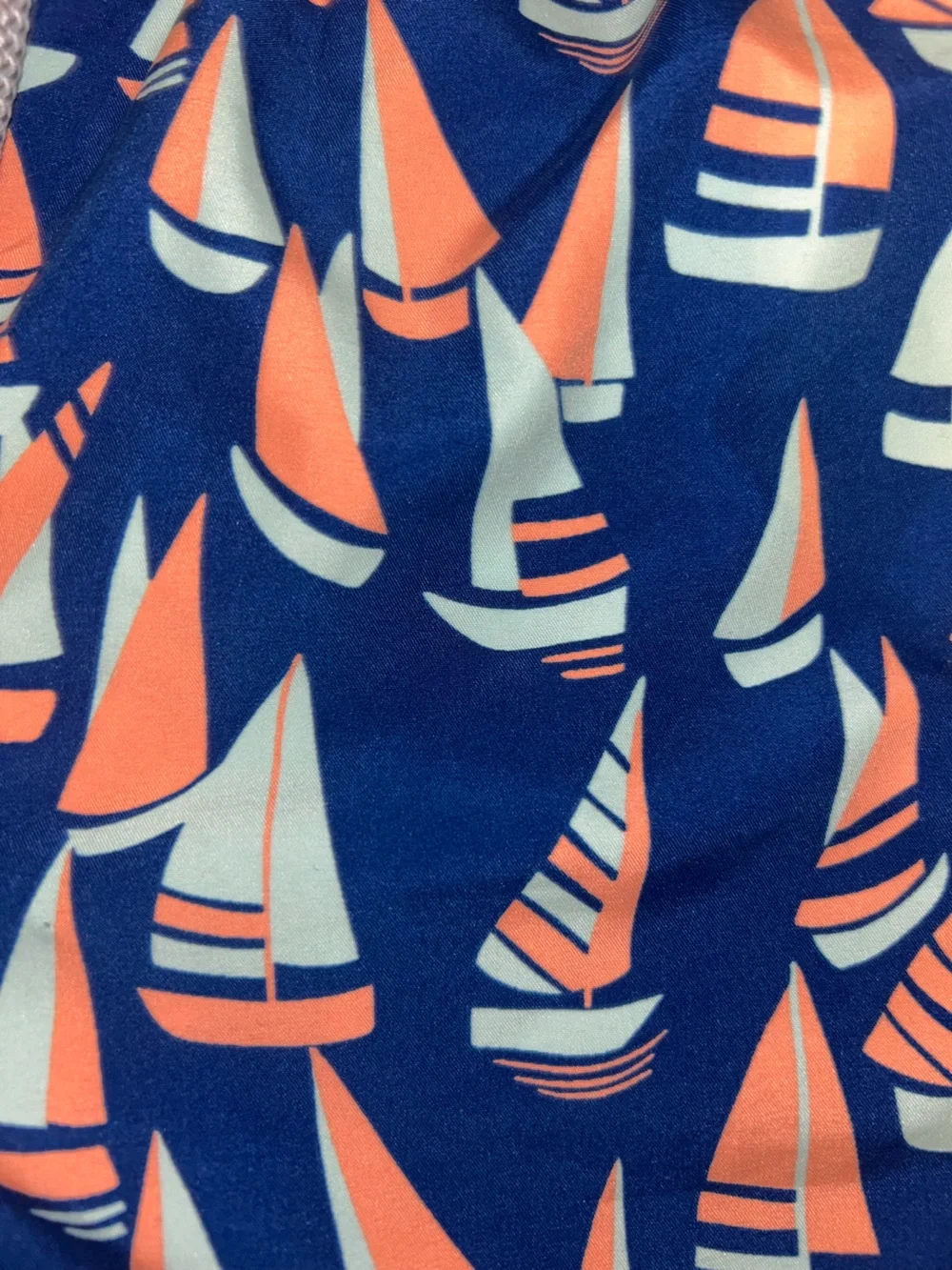 Boys Tom & Teddy Navy Swim Trunks with Coral and Light Blue Sailboat Motif